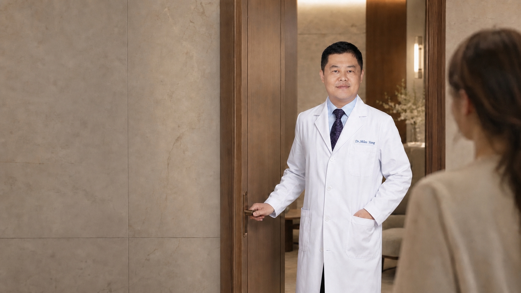 Dr. Miles welcoming a patient for consultation